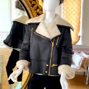 This Alexander Mcueen jacket is gorgeous warm and very stylish many details